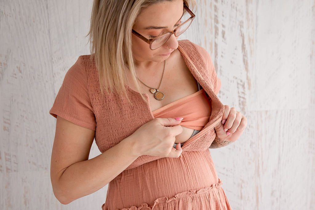 Flourish Maternity NZ - online mum and baby shop. Bella tiered dusty pink dress - pregnancy & breastfeeding flowing dress. Discrete zipper for breastfeeding access with a discretion slip underneath