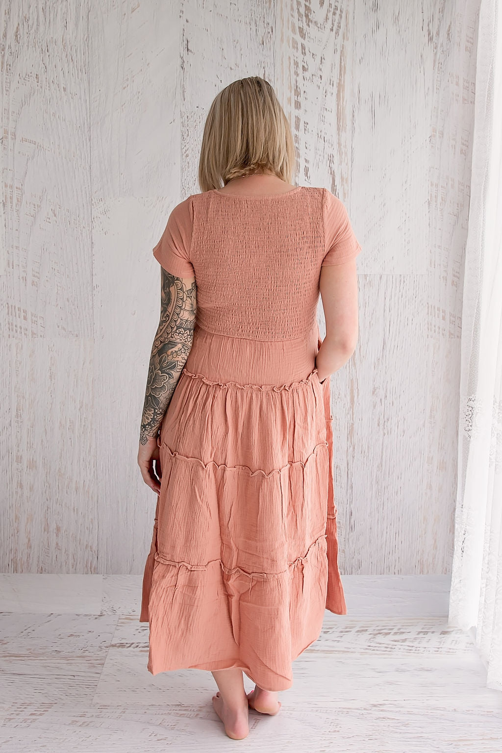 Flourish Maternity NZ - online mum and baby shop. Bella tiered dusty pink dress - pregnancy & breastfeeding flowing dress. Back view.