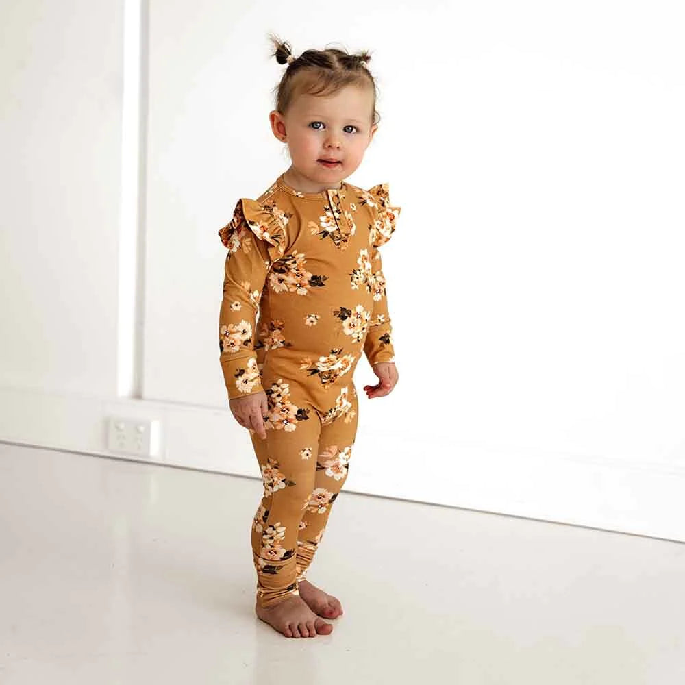 Flourish Maternity New Zealand - Baby. Golden Flower Organic Growsuit. Sizes Newborn (0000) to size 2 year old.