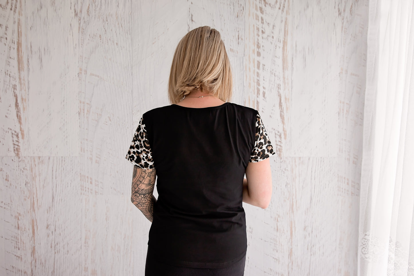 Leopard print breastfeeding tee from Flourish Maternity NZ. Postpartum t shirt with breastfeeding zipper. Back view - New Zealand.