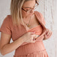 Flourish Maternity NZ - online mum and baby shop. Bella tiered dusty pink dress - pregnancy & breastfeeding flowing dress. Discrete zipper for breastfeeding access with a discretion slip underneath