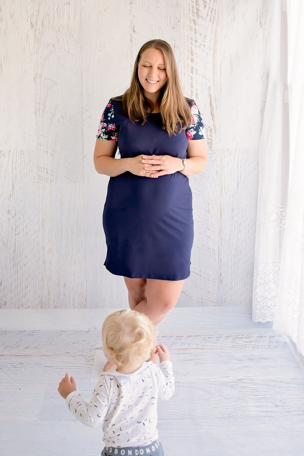 Flourish Maternity NZ floral sleeve navy breastfeeding dress with zip. Online mum and baby shop.